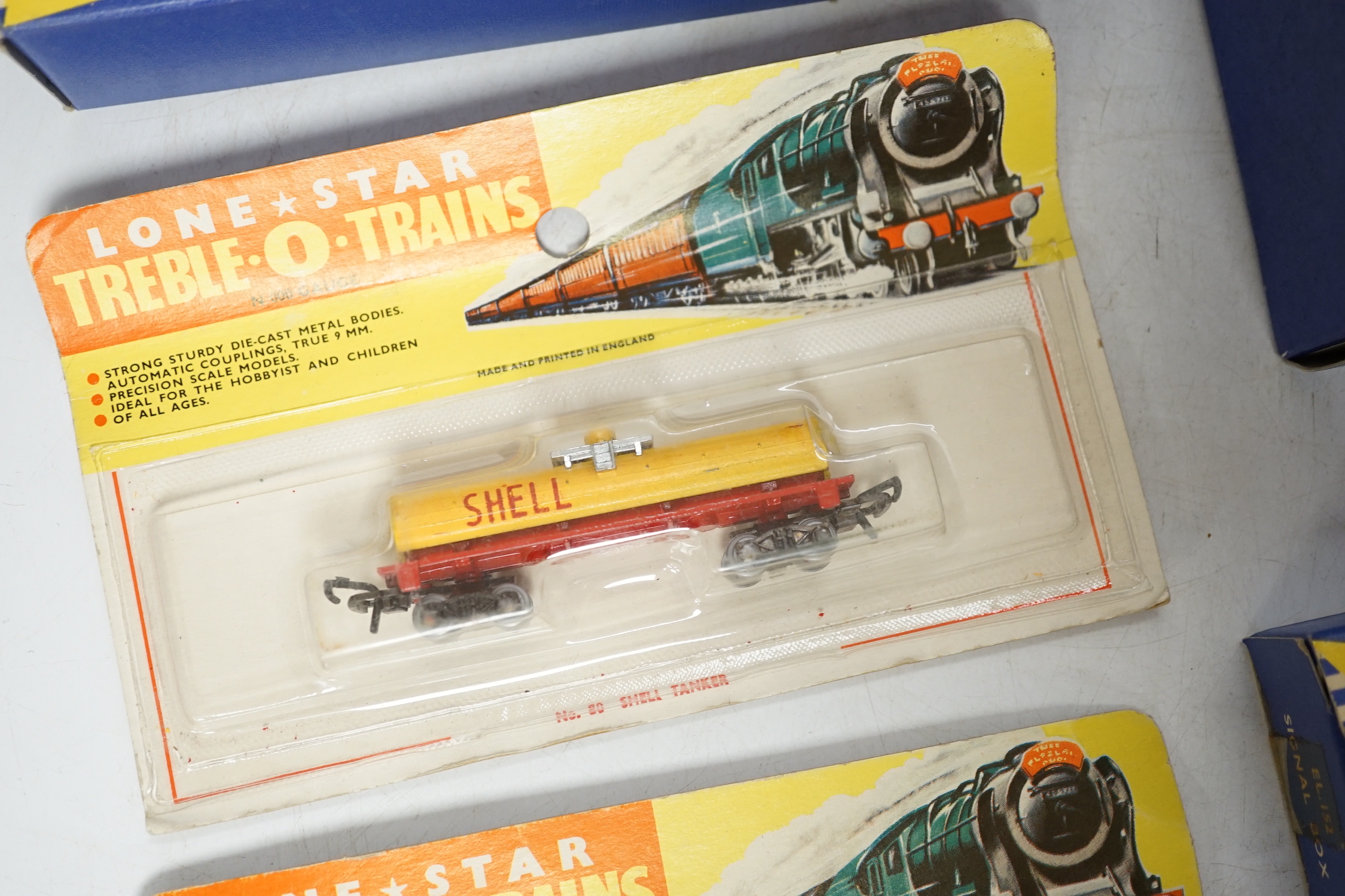 Sixty-two boxed items of Lone Star 000 gauge model railway including; a tunnel, Brake End Coaches, bogie wagons, station platforms, platform extensions, signal boxes, box vans, and telegraph poles